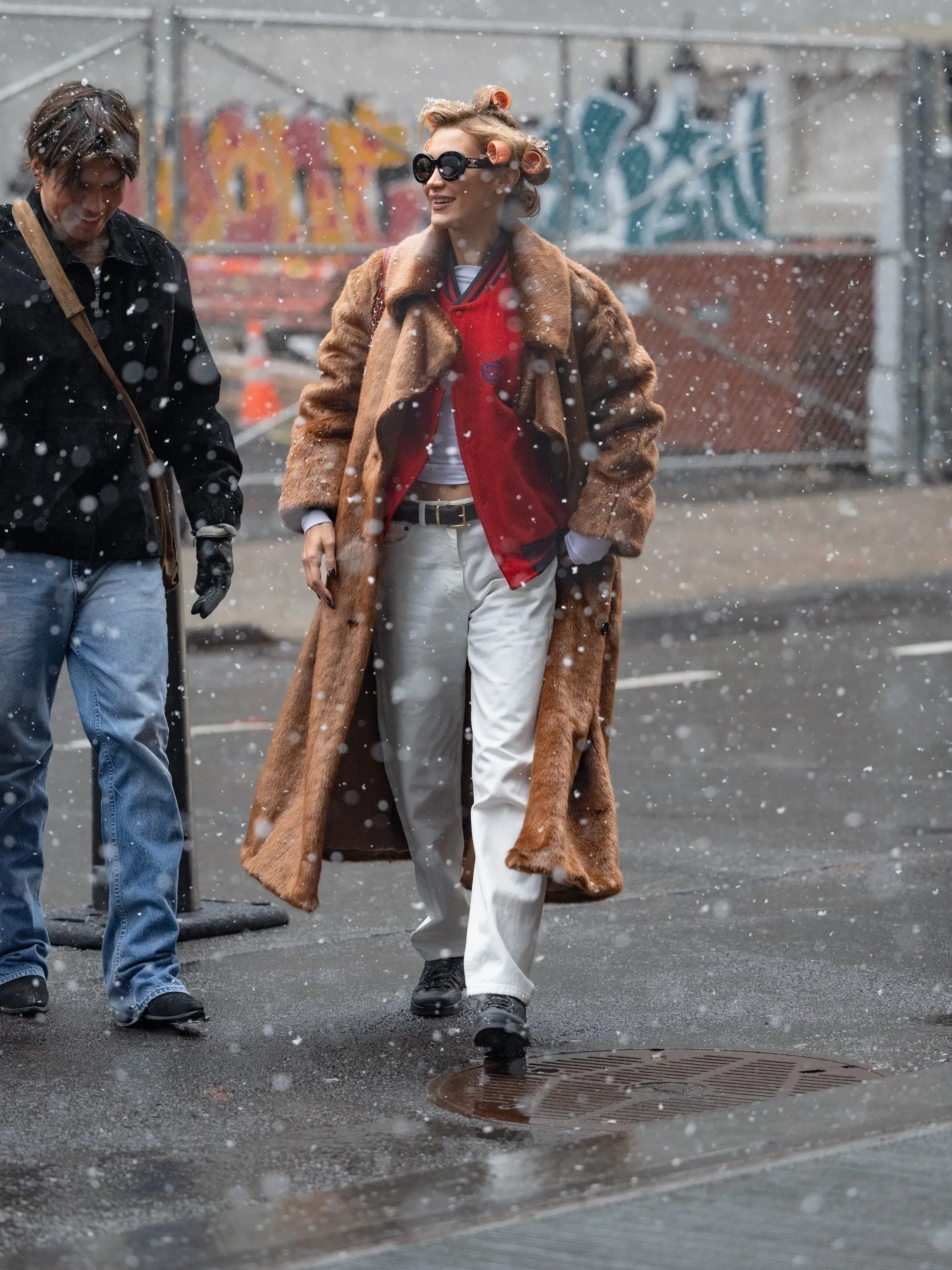 Bella Hadid Mixes Downtown Gorpcore with Grandma Glamour—Rollers and All