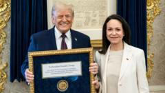 Venezuelan Nobel Peace Prize winner presents her medal to Trump